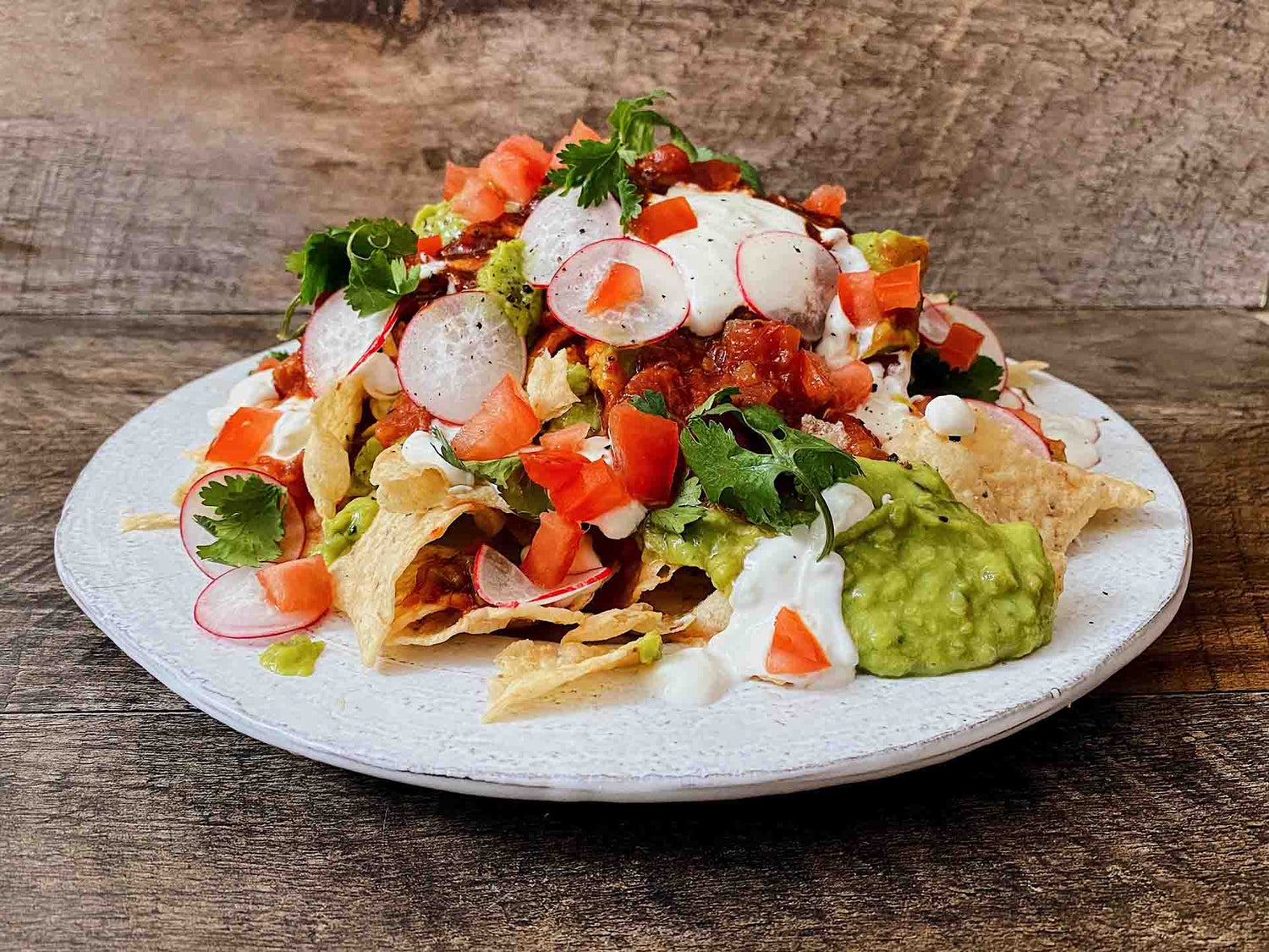 Shredded tofu nachos and relish guacamole