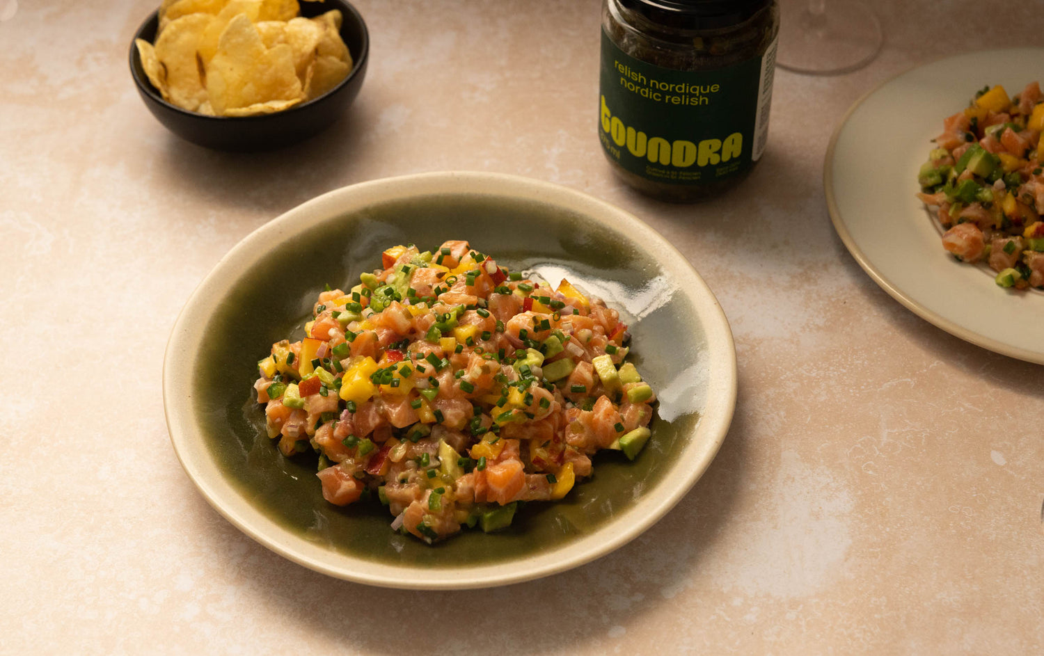 Salmon tartare with nectarines and avocado